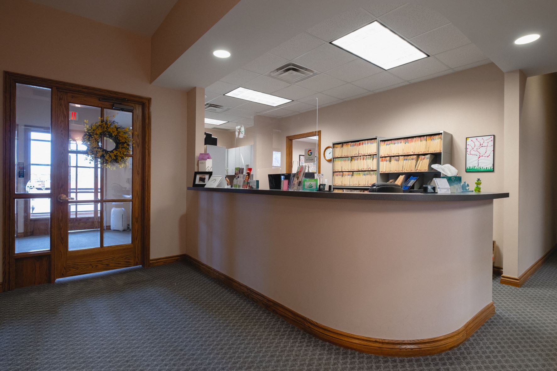 front desk and waiting room of woodhaven dental